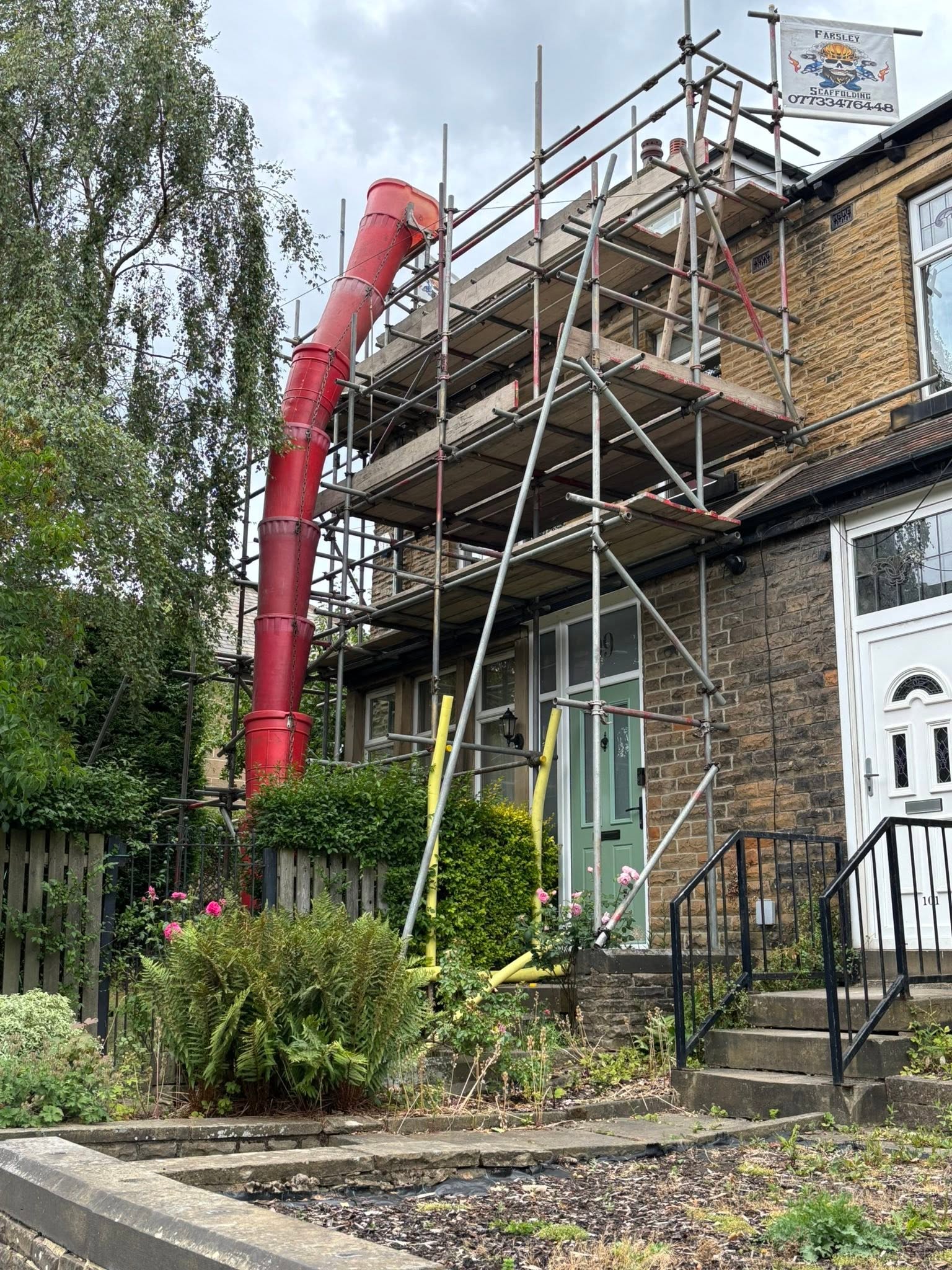 Scaffold rubbish chute fitted to a structure in Leeds